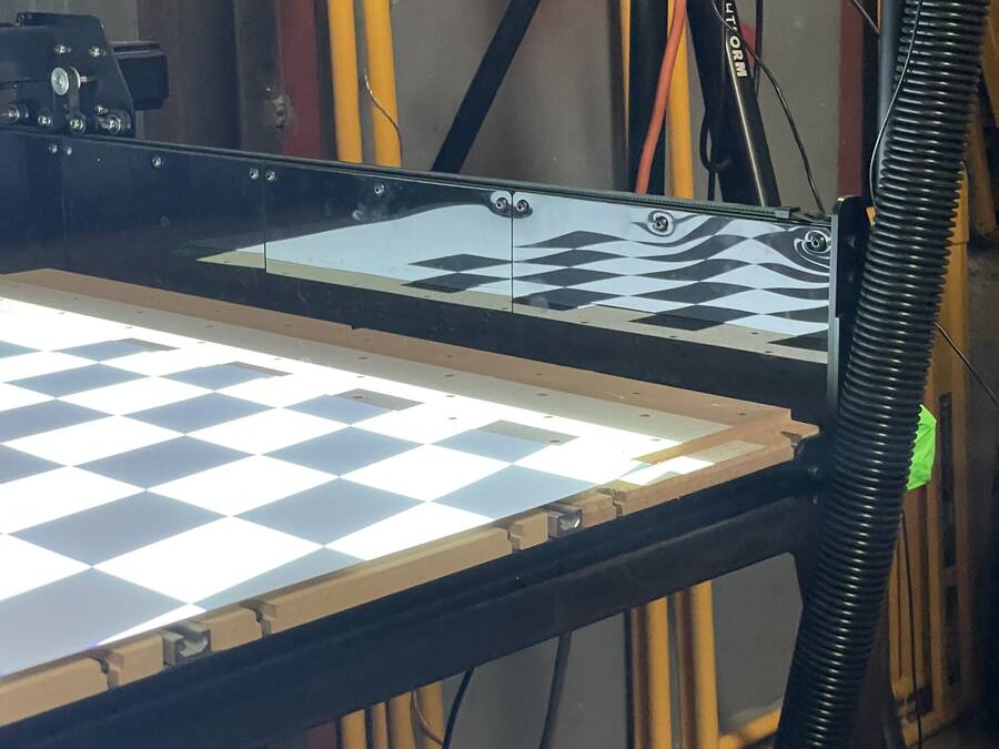 checkerboard-distorted-in-black-metal.jpeg checkerboard-distorted-in-black-metal.jpeg