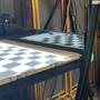checkerboard-distorted-in-black-metal.jpeg