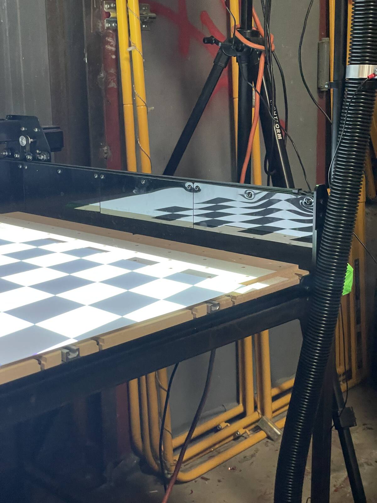 checkerboard-distorted-in-black-metal.jpeg